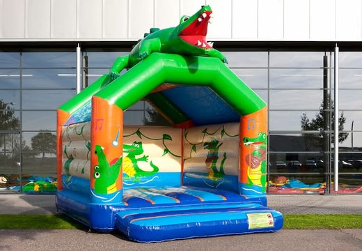 Buy standard bounce house with a 3D object of a crocodile at the top for children. Order bounce house online at JB Inflatables America