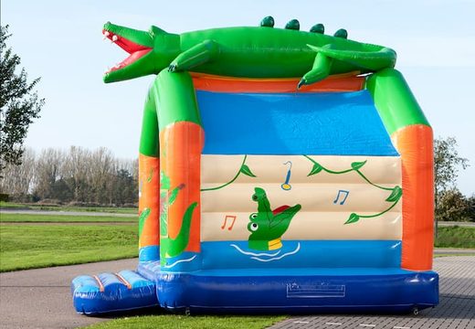 Order unique standard bounce house with a 3D object of a crocodile at the top for children. Buy bounce house online at JB Inflatables America