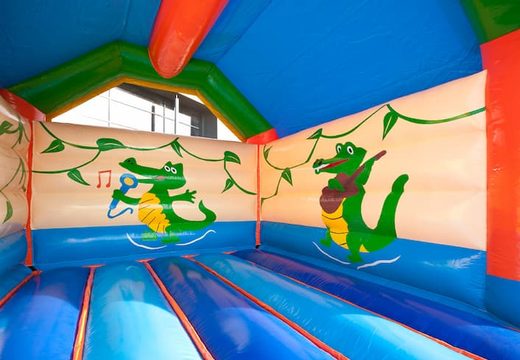 Buy standard bounce house with a 3D crocodile object on top for kids. Order bounce house online at JB Inflatables America