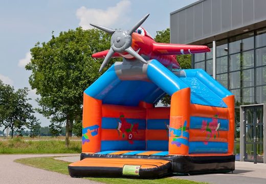 Buy a standard airplane bouncy castle in striking colors with a large 3D object for children on top. Order bouncy castles online at JB Inflatables America