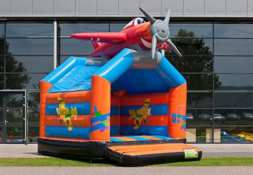 Standard airplane bounce houses for sale in striking colors with a large 3D object for children on top. Buy indoor bounce houses online at JB Inflatables America