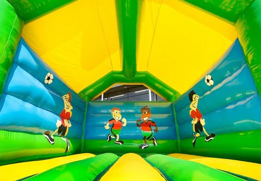 Buy a standard bounce house in striking colors with a large 3D object of a soccer ball for children on top. Buy inflatables bounce houses online at JB Inflatables America