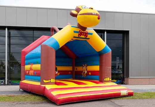Buy a super bounce house covered with cheerful animations in monkey theme for children. Order bounce houses online at JB Inflatables America 