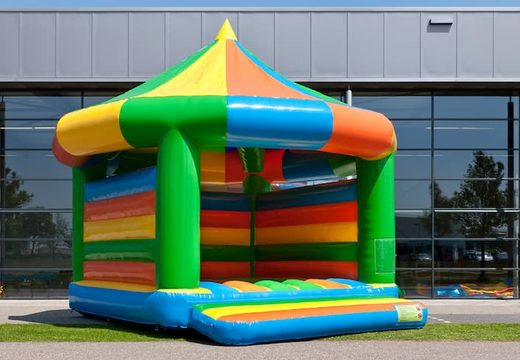 Big carousel bounce house with roof for kids. Order bounce houses online at JB Inflatables America 