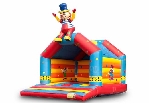 Buy a large indoor bouncy castle in theme seated clown for children. Order inflatables online at JB Inflatables America 