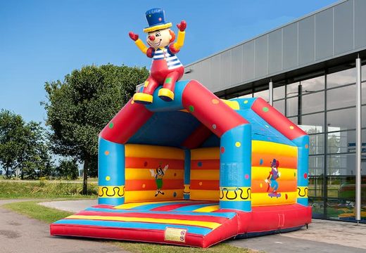 Super bounce house with roof in clown theme for kids. Buy bounce houses online at JB Inflatables America