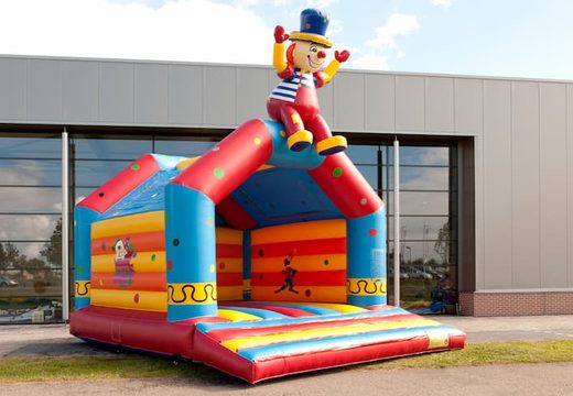 Buy a big bounce house with roof in clown theme for kids. Order bounce houses online at JB Inflatables America 