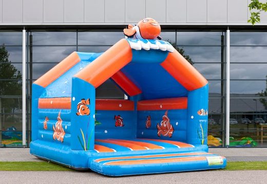 Buy a super bounce house covered with cheerful animations in clownfish nemo theme for children. Order bounce houses online at JB Inflatables America 