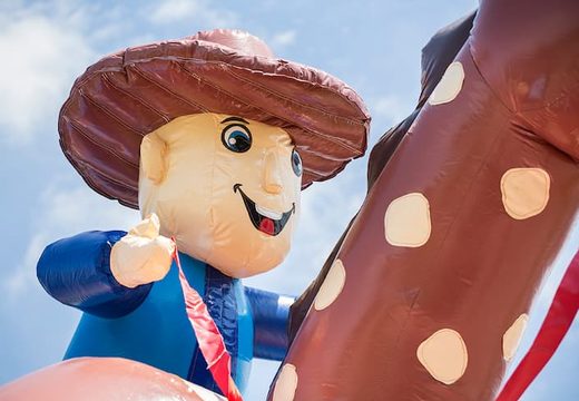Buy a super bounce house covered with cheerful animations in a cowboy theme for children. Order bounce houses online at JB Inflatables America 