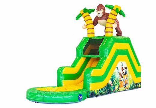Buy a jungle theme inflatable water slide bouncy castle with a 3D object of a gorilla on top. Order inflatable bouncy castles online at JB Inflatables America