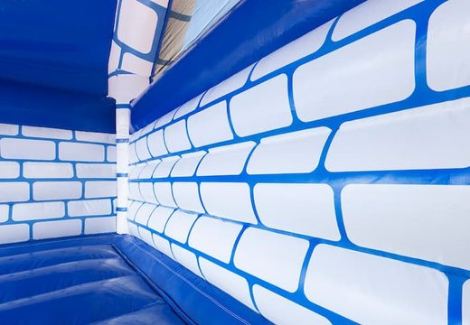 Buy a large covered blue and white bouncy castle in the theme castle for children. Order inflatables online at JB Inflatables America