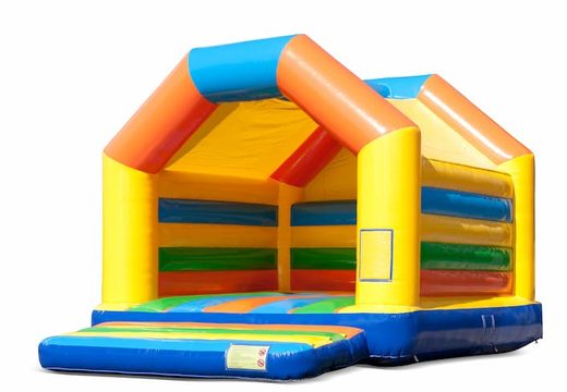 Buy a large indoor bounce house in the colors yellow, orange, green and blue for children. Order bounce houses online at JB Inflatables America