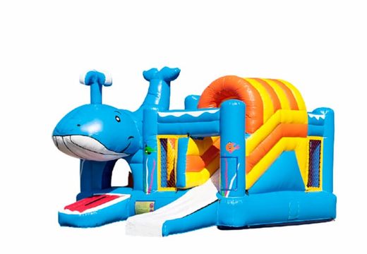 Buy an inflatable multiplay bounce house and obstacles in a whale theme with slide for children. Order inflatable bounce houses online at JB Inflatables America