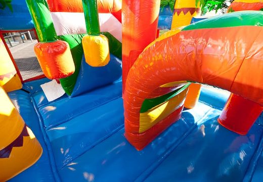 Bouncer in beach theme with a slide for children. Buy inflatable bouncers online at JB Inflatables America