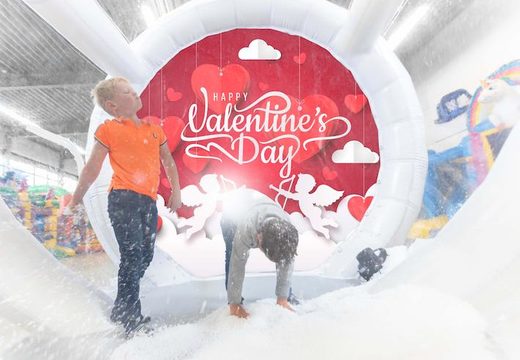 Buy unique inflatable snow globe airtight XL in valentine theme for both young and old. Order inflatable winter attractions now online at JB Inflatables America