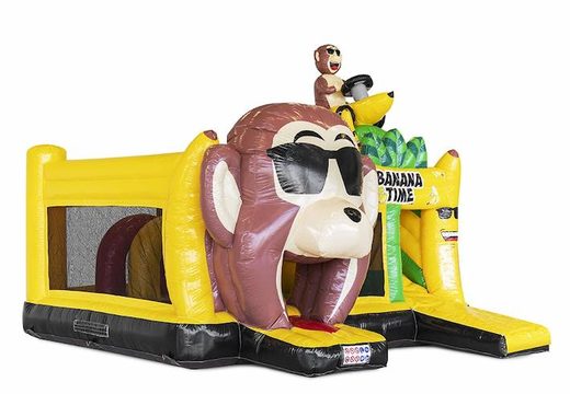 Order an inflatable bouncy castle with obstacles in it and a slide in banana monkey theme