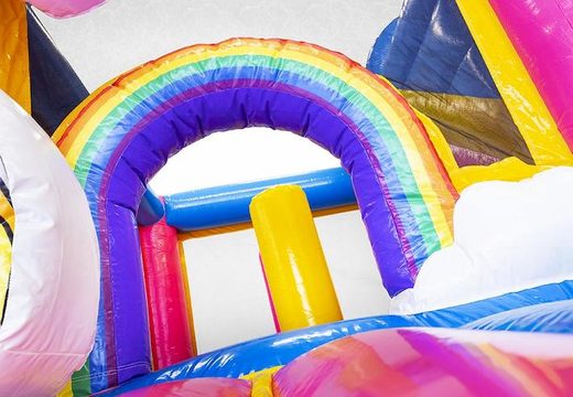 Air cushion inflatable in unicorn theme for children with slide and buy objects in it