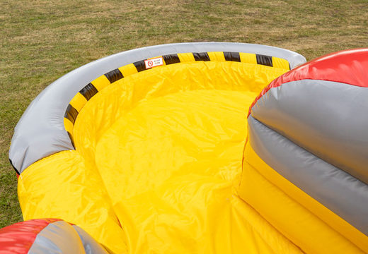 Order large inflatable double slide in red with yellow for children to play on