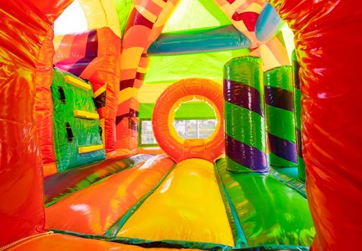 Inflatable bouncy castle covered with slide in hippy theme with many colors order
