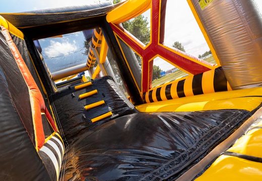 Mega voltage themed assault course at JB Inflatables