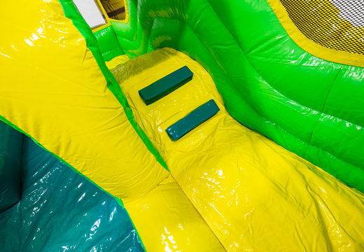 Order Inflatable Dinoworld bouncy castle with prints for children. Buy bouncy castles online at JB Inflatables America