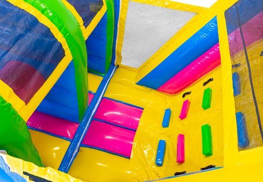 13 meter long Happy colors inflatable obstacle course for children. Order inflatable obstacle courses now online at JB Inflatables America
