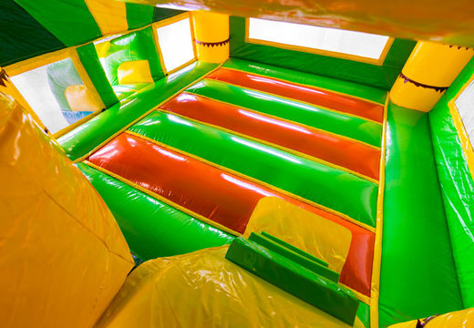Order inflatable Dropslide Combo Jungle bouncy castle for kids. Inflatable bouncy castles with slide for sale at JB Inflatables America
