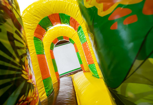 Buy Multiplay bouncy castle with slide in Dinoworld theme for your children. Order inflatable air cushions online now at JB Inflatables America