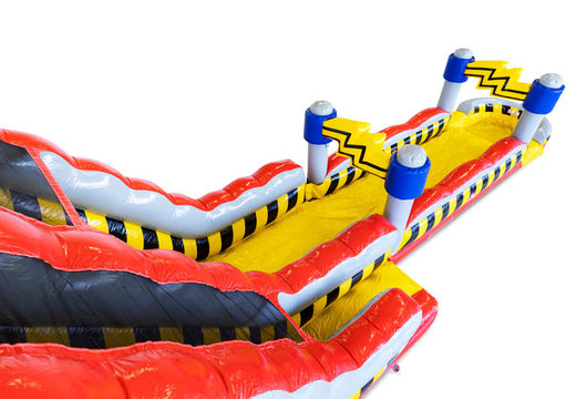 Air cushion with water slide in red, yellow and black for sale at JB Inflatables