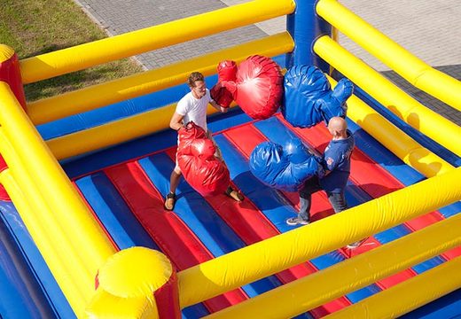 Boxing against each other in an inflatable boxing ring