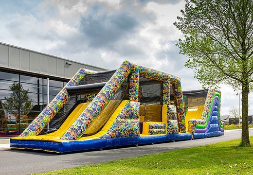 Bouncy castle with slide and obstacles