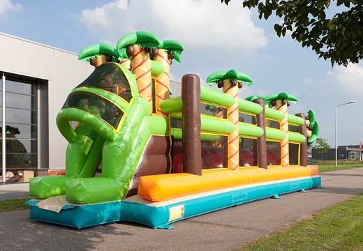 Palm trees on bouncy castle with jungle theme