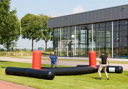 Play volleyball with your feet with an inflatable soccer field for sale at JB Inflatables