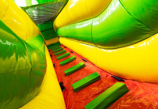 Stairs to slide on Multiplay 4-in-1 bounce house slide in Dino theme